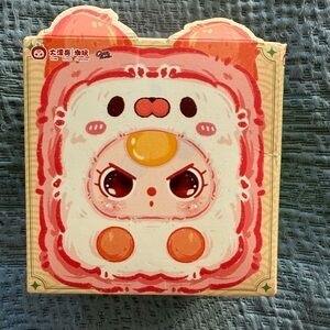 Baby Three Key Chain - open box